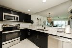 Feel the vibes in this brand new kitchen with custom backsplash, granite counters and stainless steel appliances